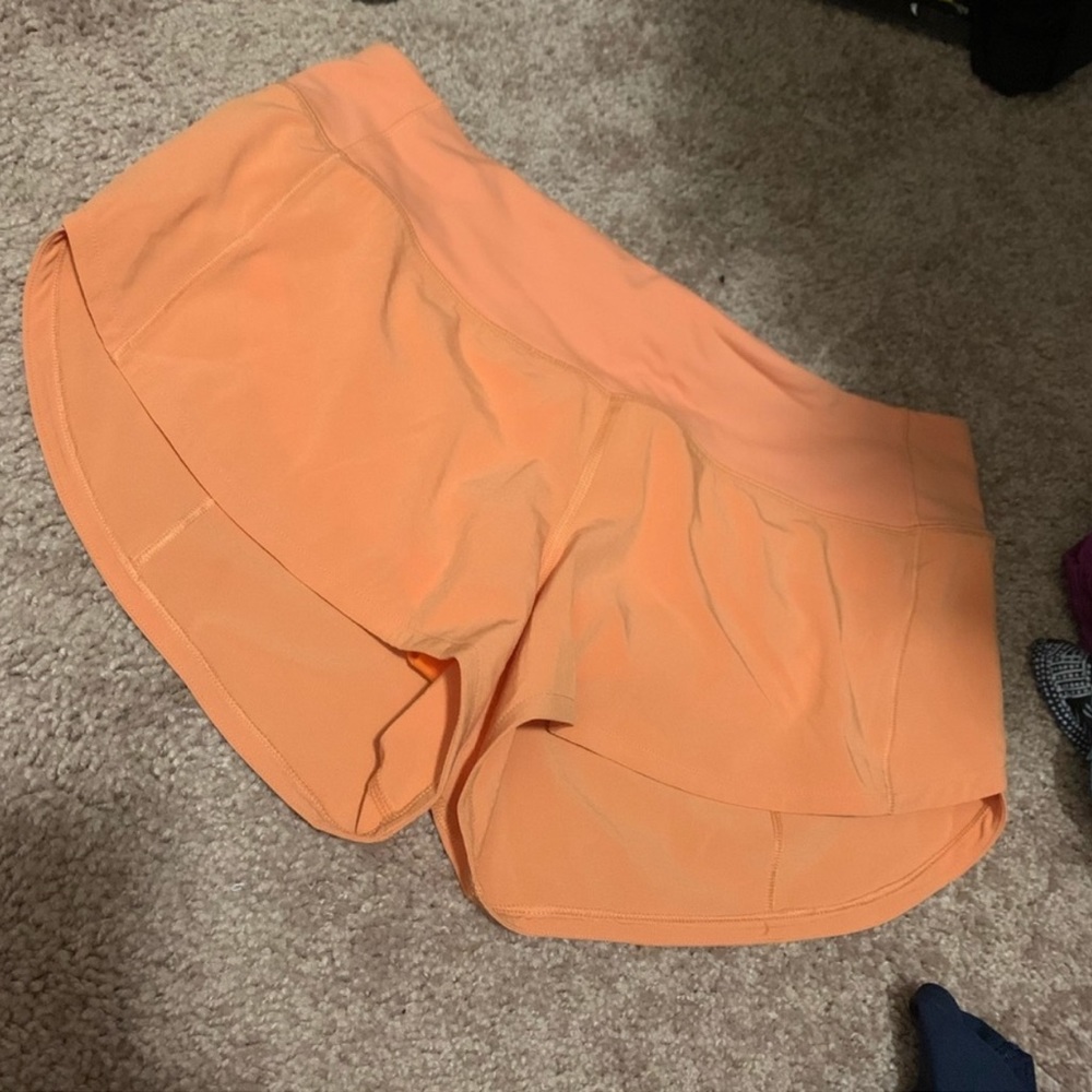 RARE orange lululemon speed ups 2.5 inch